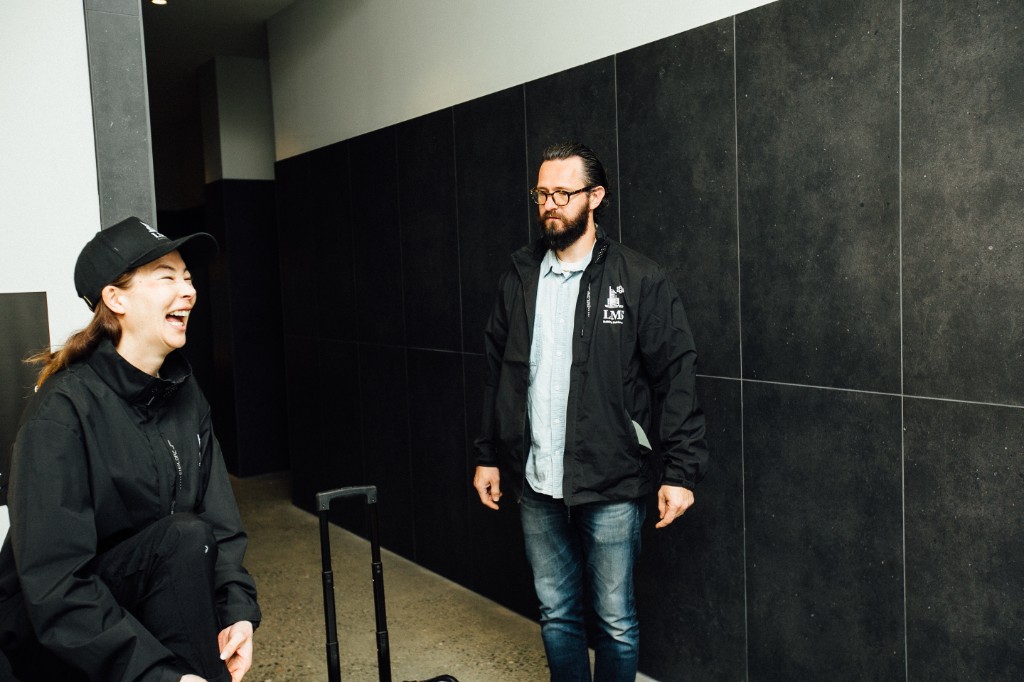 Two LMS Building Maintenance team members in company jackets